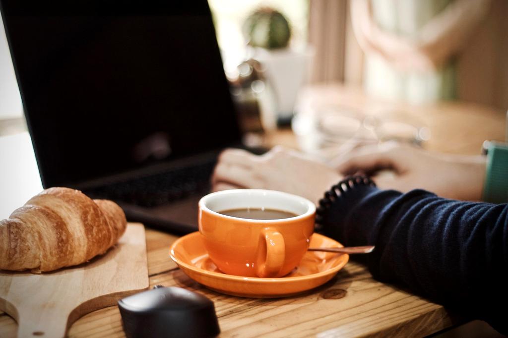 Futuristic home with neural AI interface displaying holographic controls